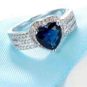 Heart-Shaped Blue and Silver Ring